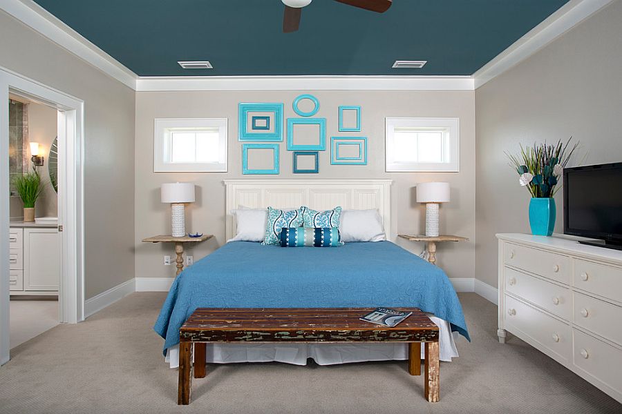 Fabulous blue picture frames blend in with the color scheme of the room