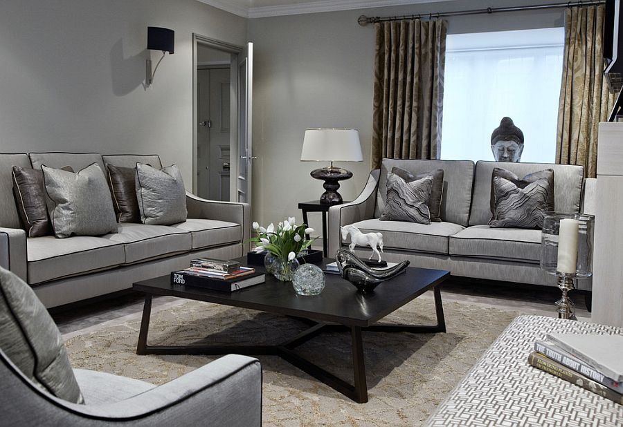 Fabulous living room in gray with a black coffee table