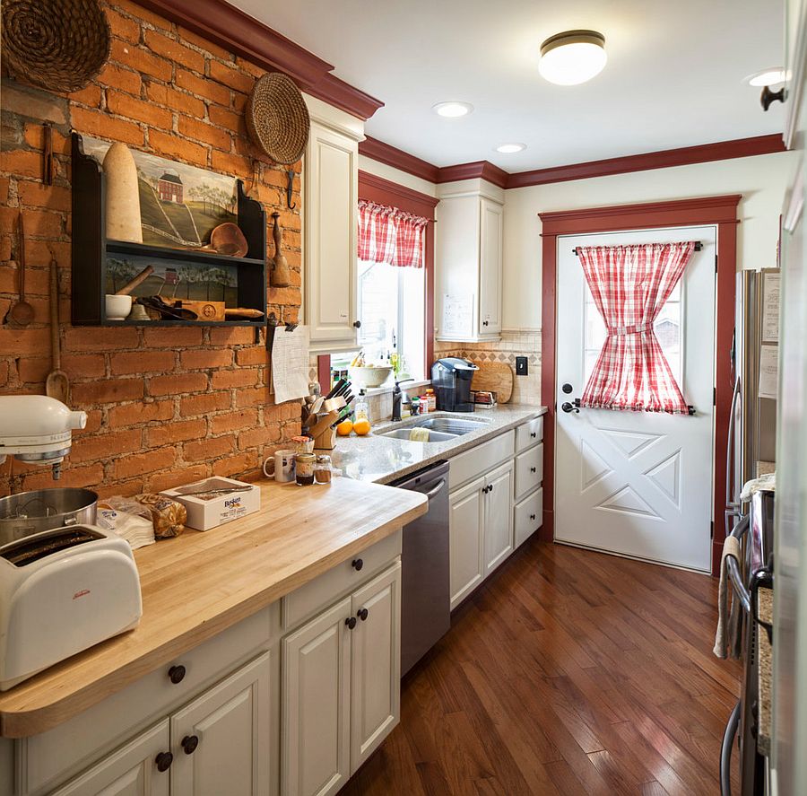 Farmhouse kitchen with antique shelf and brick wall backdrop [Design: Handy Home Guys]