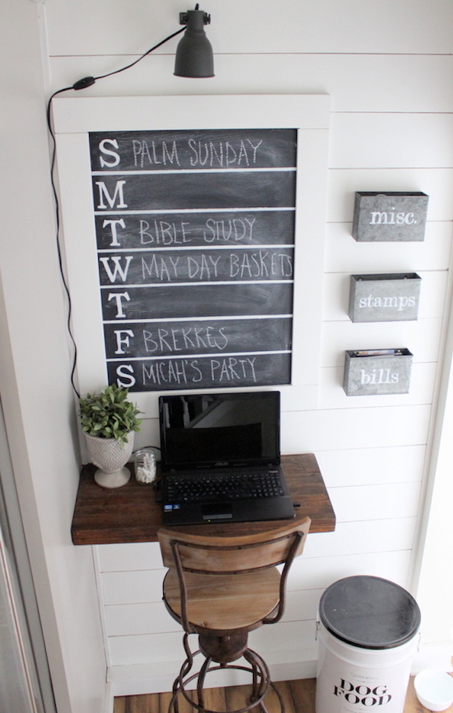 Framed weekday chalkboard calendar for a small office space