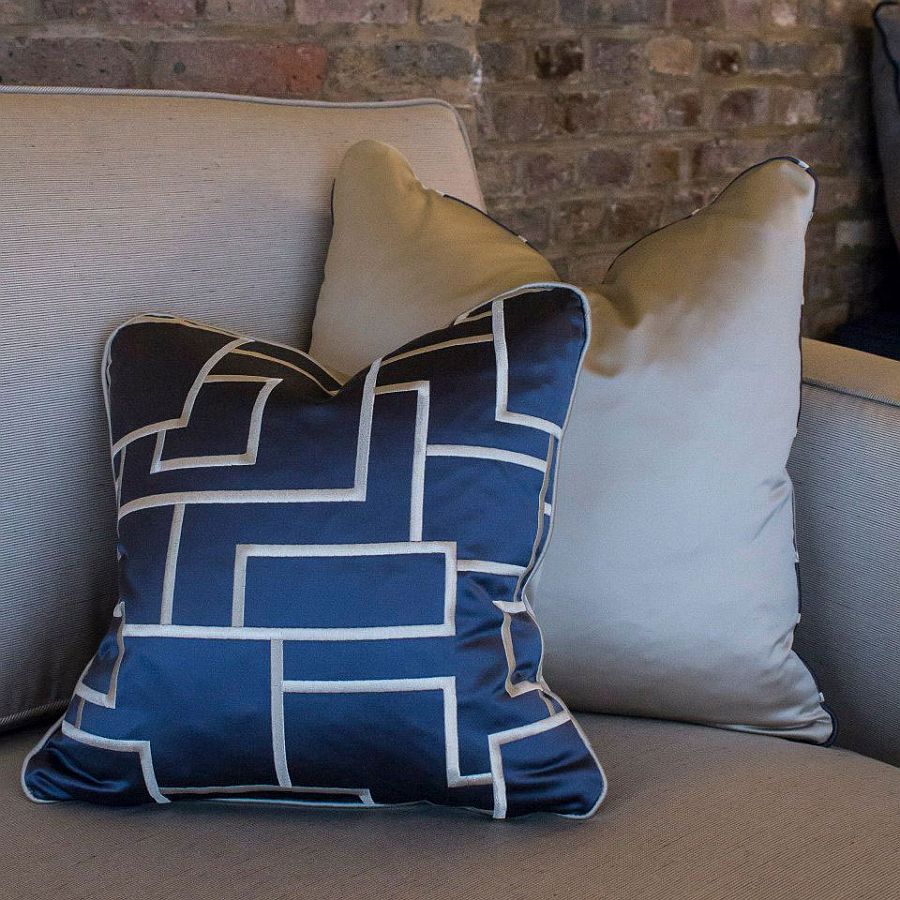 Gorgeous accent pillows add color to the London apartment