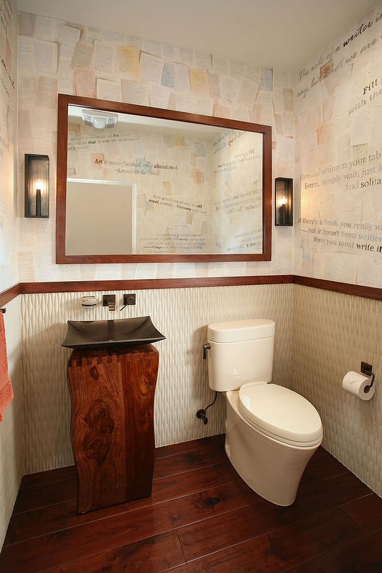 Hand painted wall paper by Lucy Jensen steals the show in this bathroom