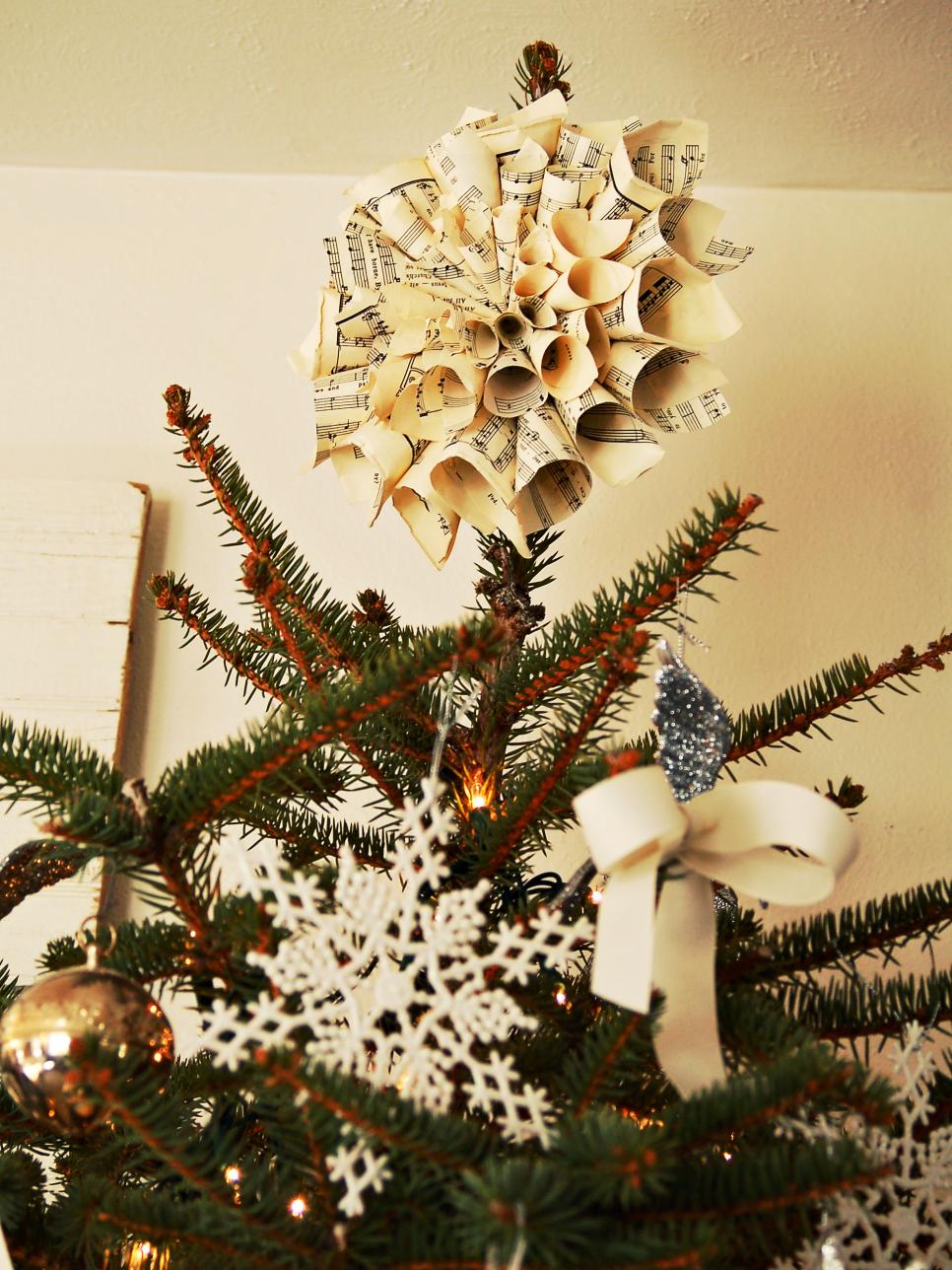 Handmade tree topper made from old music sheets