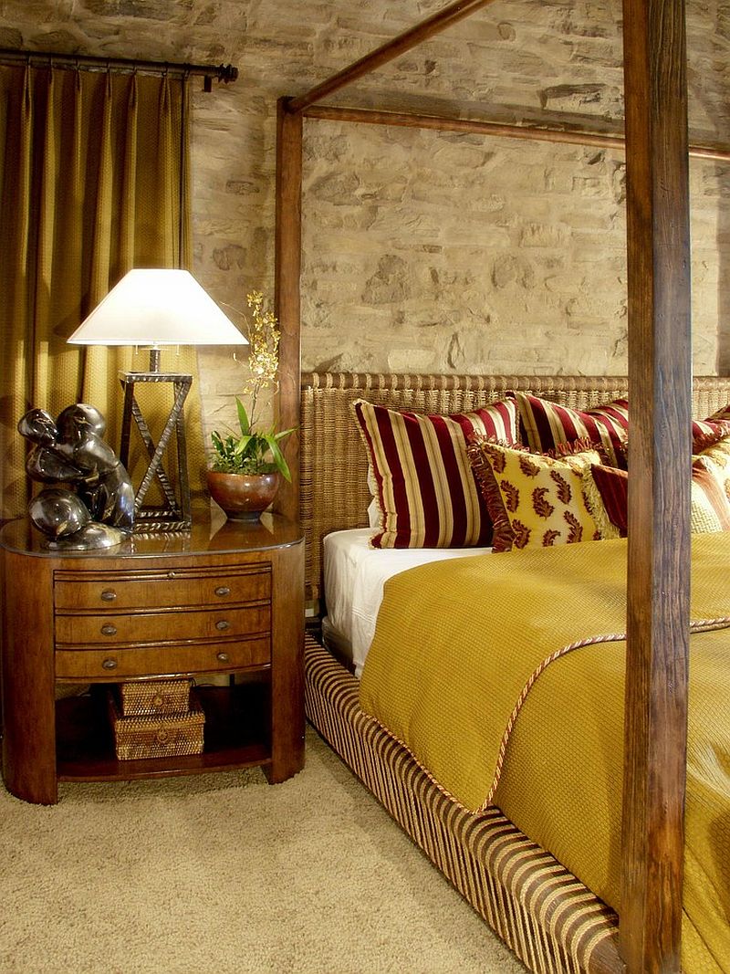 It is the stone wall that brings an air of authenticity to this Mediterranean bedroom