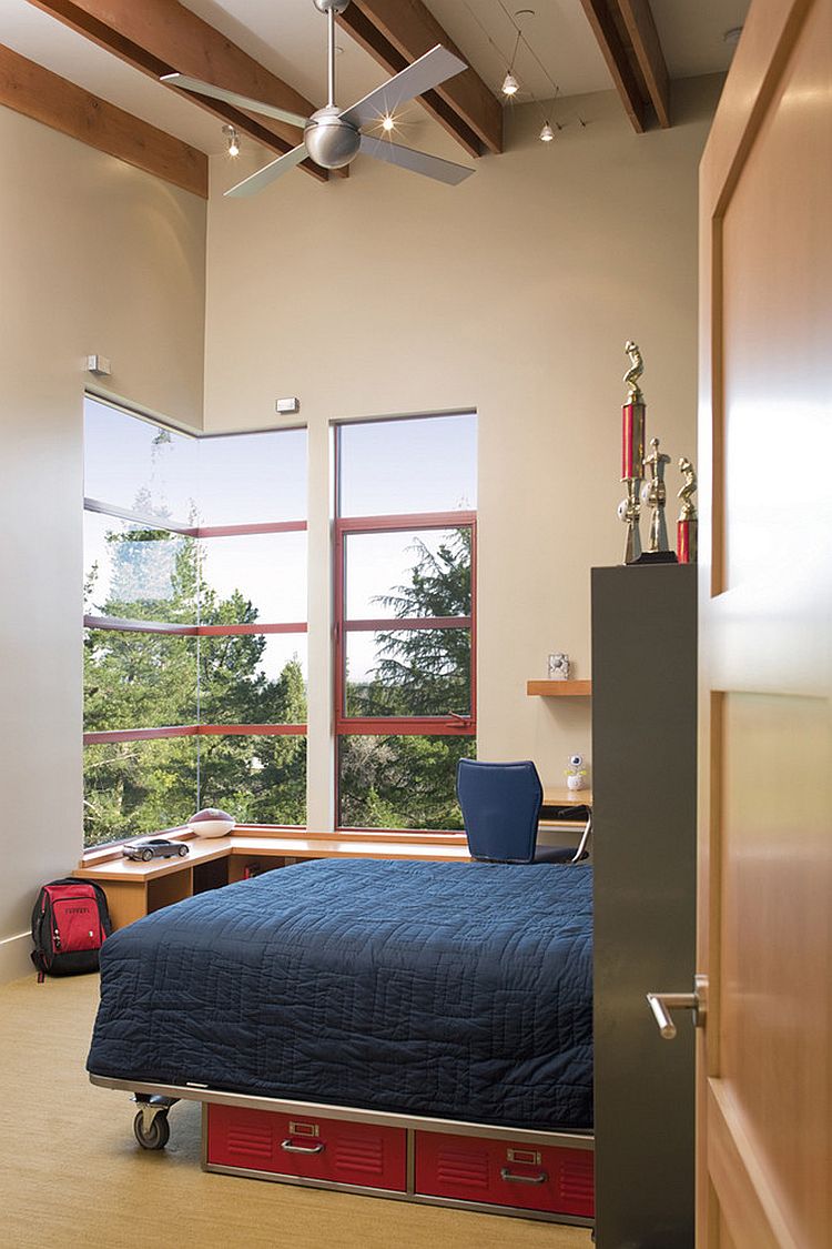 Kids' bedroom with space-saving bed on wheels [From: Banducci Associates Architects / John Sutton Photography]