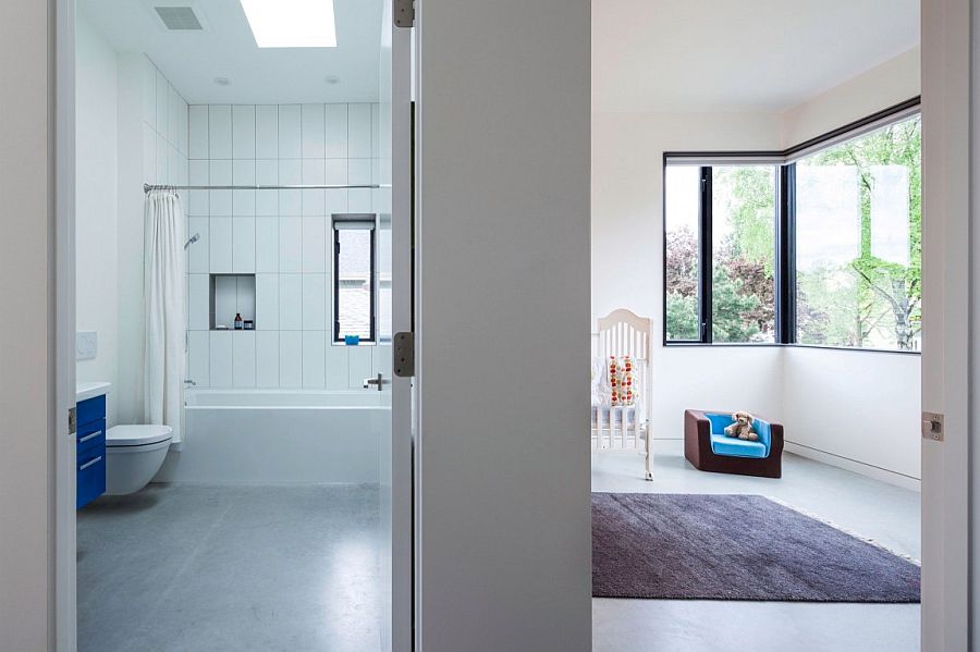 Kids' room and bathroom of the economical Vancouver home in white