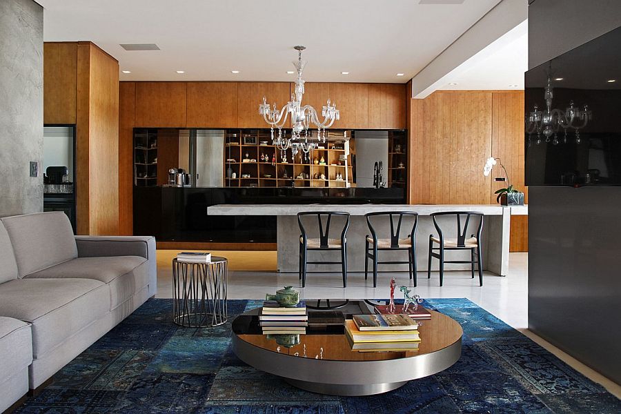 Kitchen and dining area turns the living space next to them into a comfy family zone