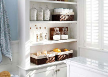 Large-built-in-shelving-and-cabinets-for-lots-of-extra-bathroom-storage-217x155