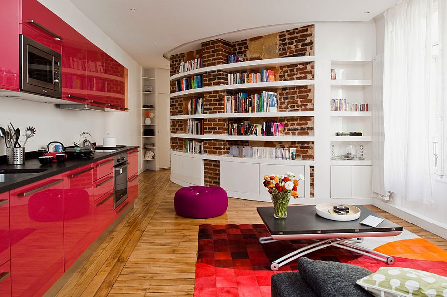 Living room with color, curved brick wall and chic coffee table