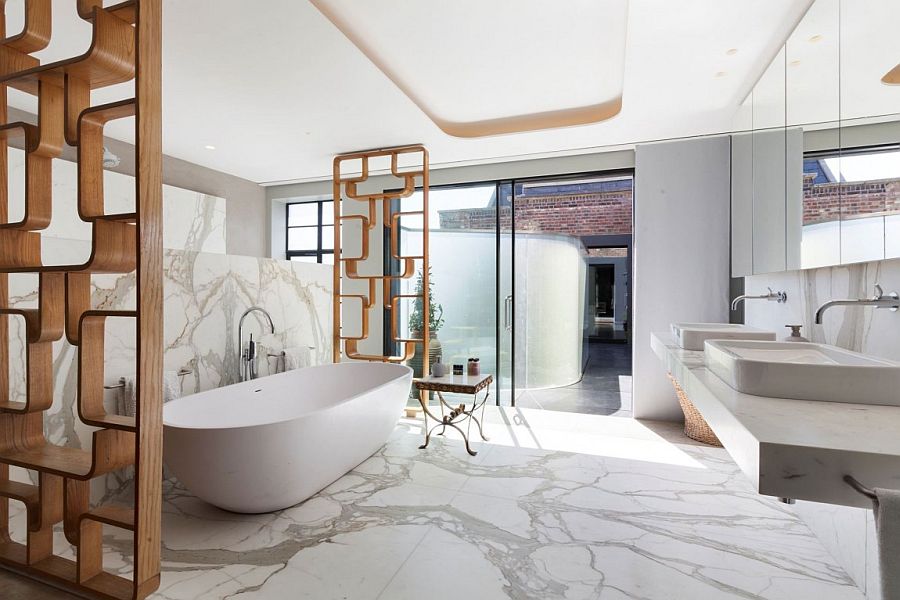 Marble-cald opulence of the lavish bathroom inside the London penthouse