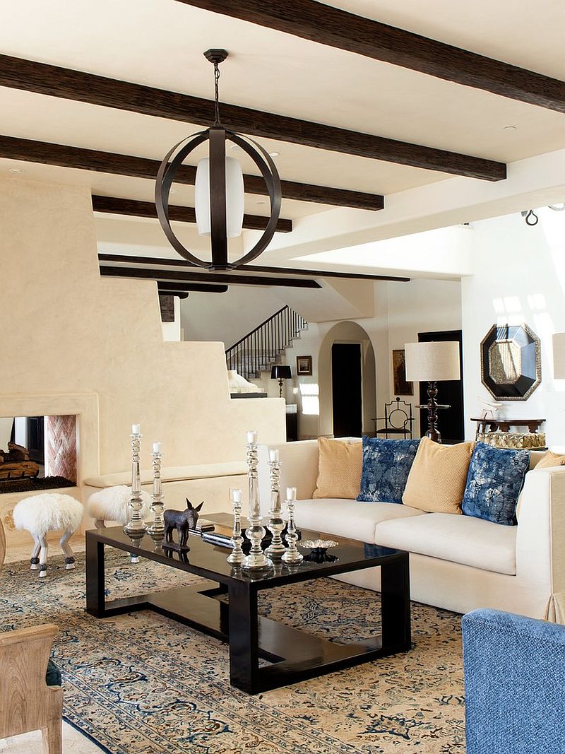 Mediterranean living room with a curated hint of black [Design: Brion Jeannette Architecture]