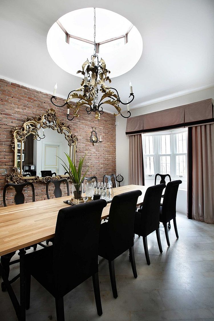 Mirror frame and chandelier bring classic touches to the modern dining room [From: Kadir Asnaz Photography]