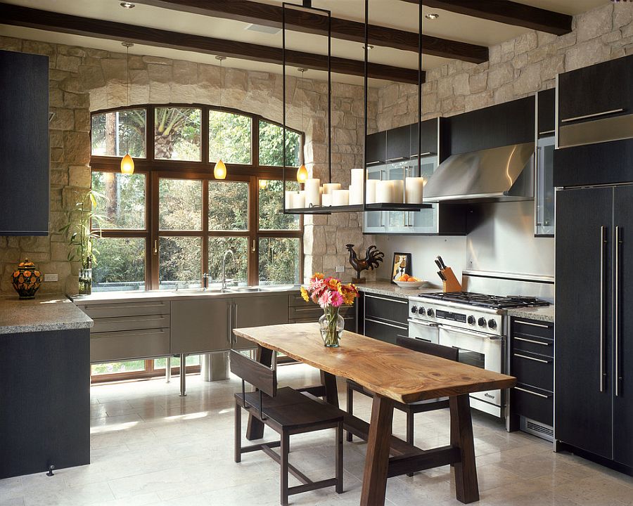 Modern Mediterranean kitchen with custom arched window and stone walls [Design: DuCharme Architecture]