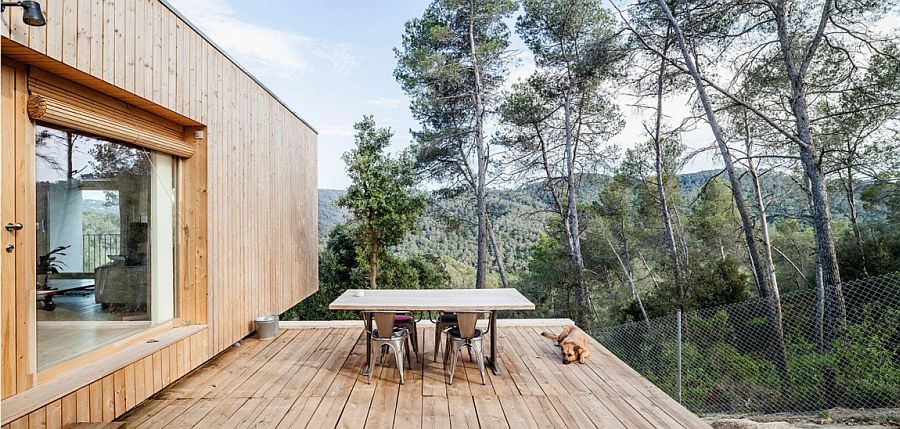 Outdoor deck space seems like a natural extension of the wooden structure