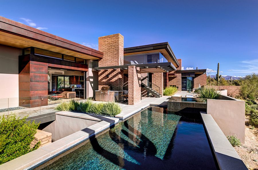 Pool area adds both to the aesthetics and temperature control of the desert home