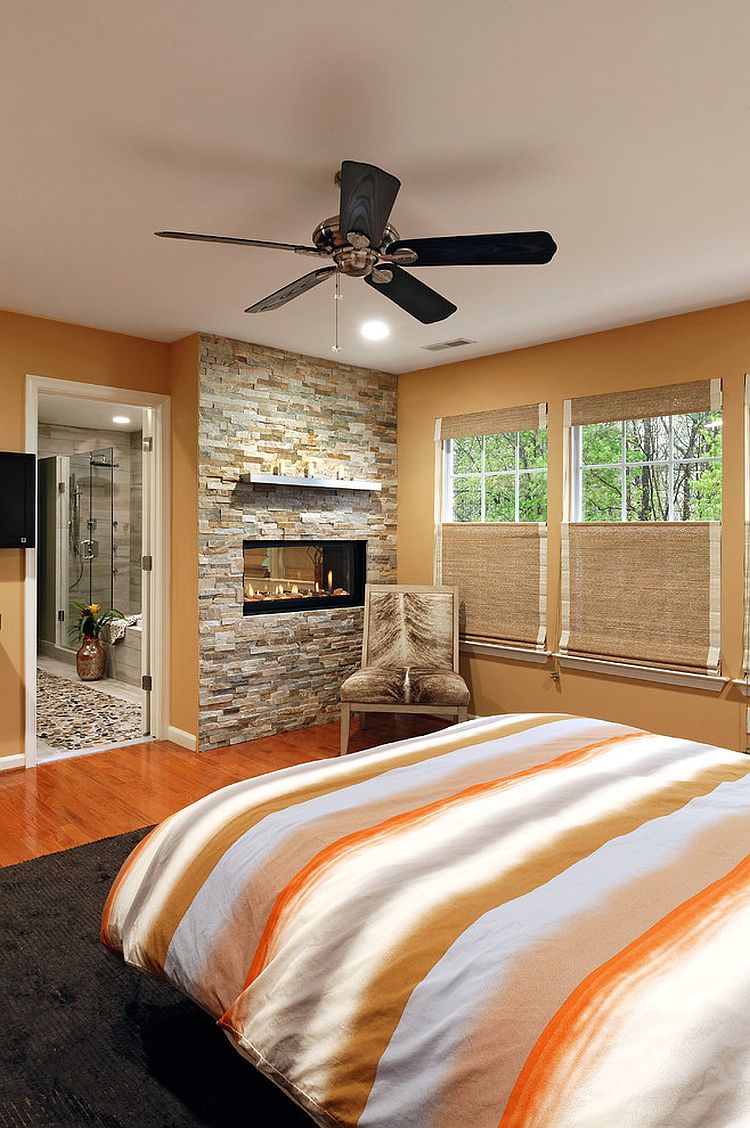 Posh modern bedroom with Interlocking Quartzite fireplace wall [Design: Davida's Kitchen & Tiles]