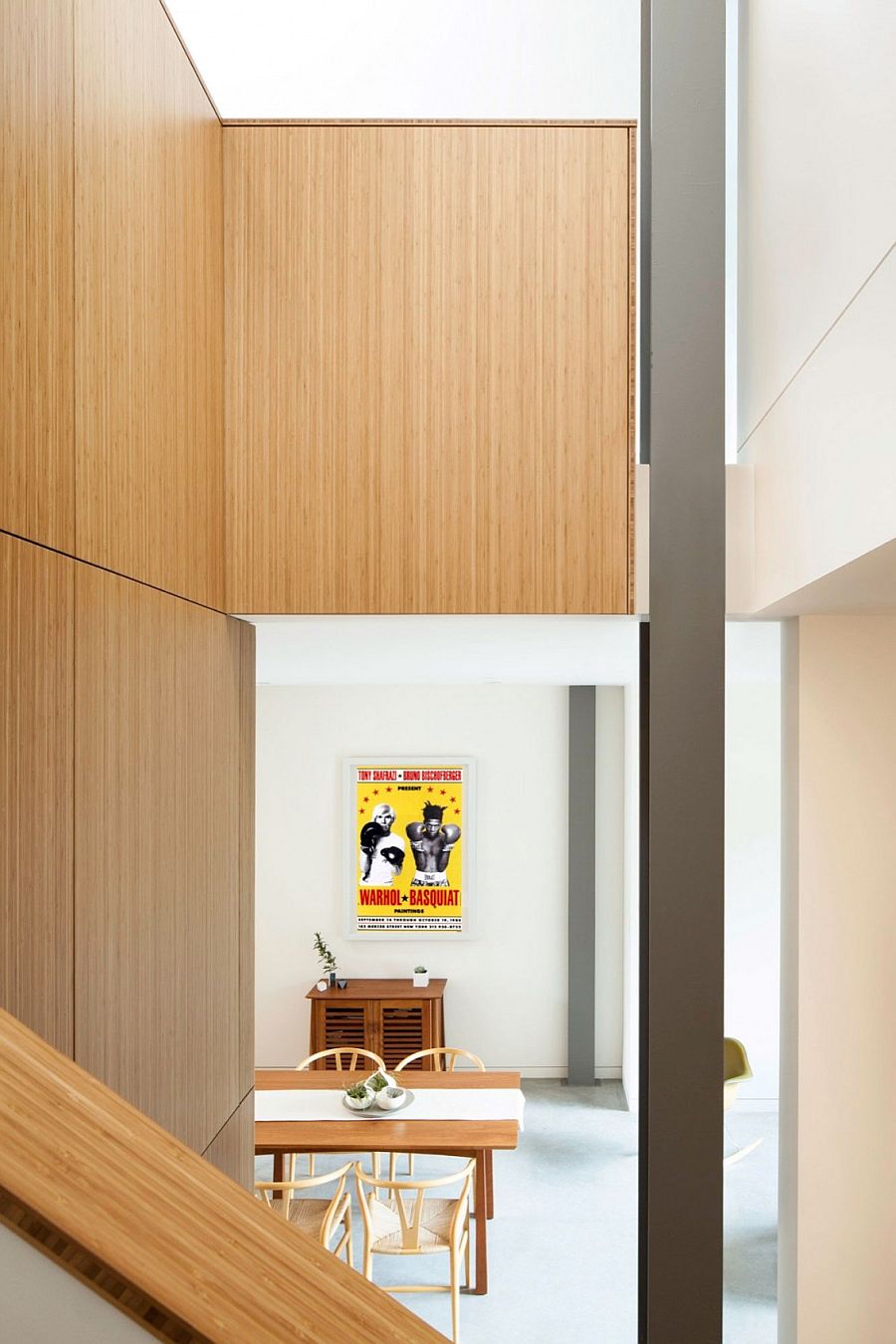 Poster adds color to the neutral interior in white