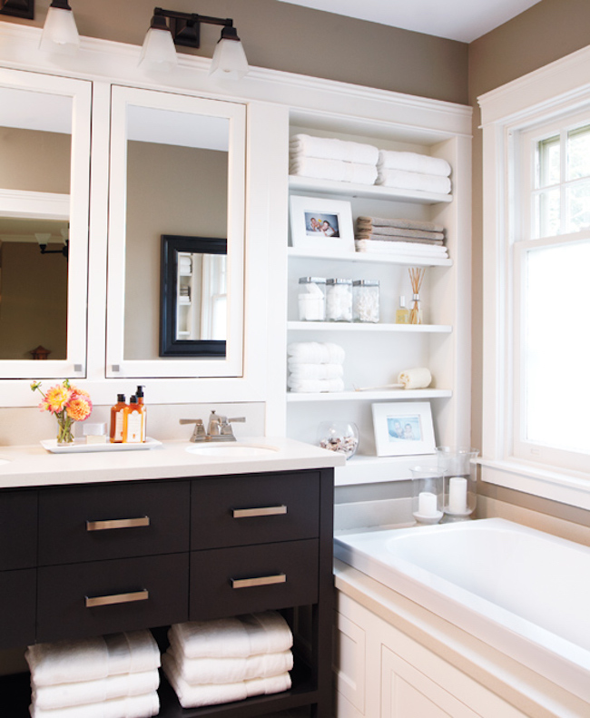 Recessed shelving beside the bathtub