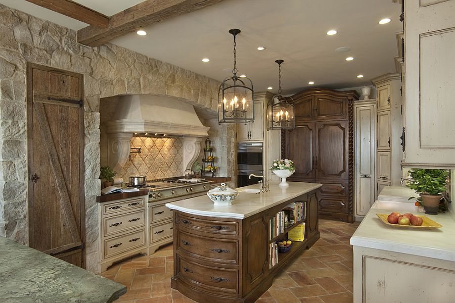 Reclaimed French stone fashions a cozy ambiance in the Mediterranean kitchen [Design: GDC Construction]