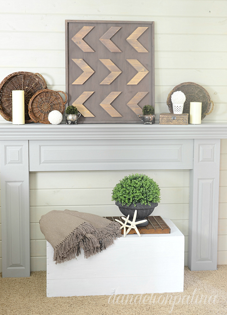 Rustic arrow art for a fireplace mantel