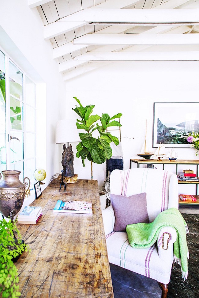 Rustic wood desk in a bright office space