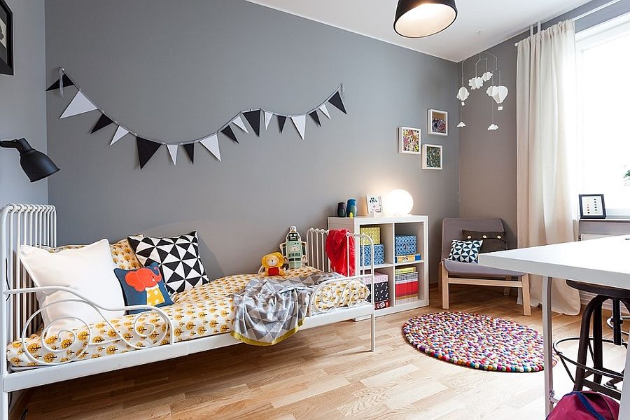 Scandinavian style kids room with an unassuming gray backdrop