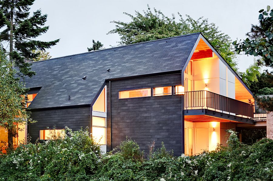 Shingle roofing material continues down the walls giving the Seattle home a classic look