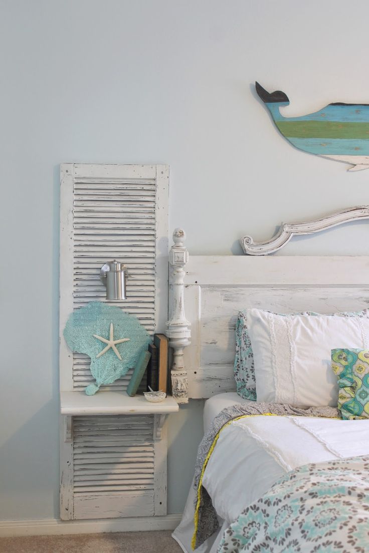 Shutter repurposed as a night table in a shabby chic bedroom