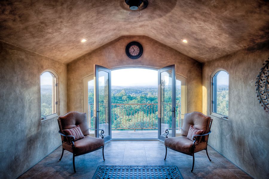 Small and cozy sunroom with minimal decor and a lovely view