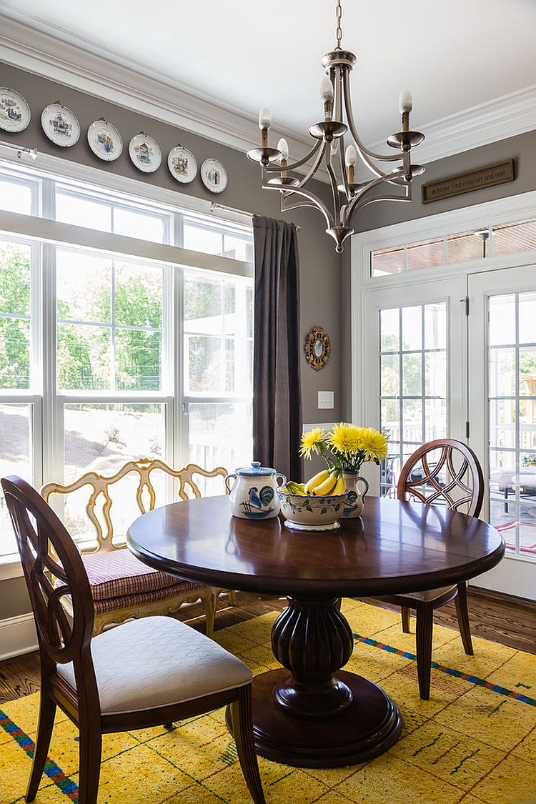 Small and stylish dining room in gray with a dash of yellow [Design: Form & Function]