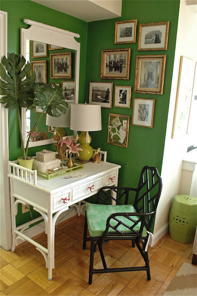 Small but serene office in a corner with a green wall