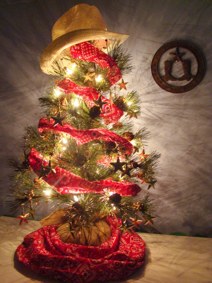 Small cowboy-themed Christmas tree with hat