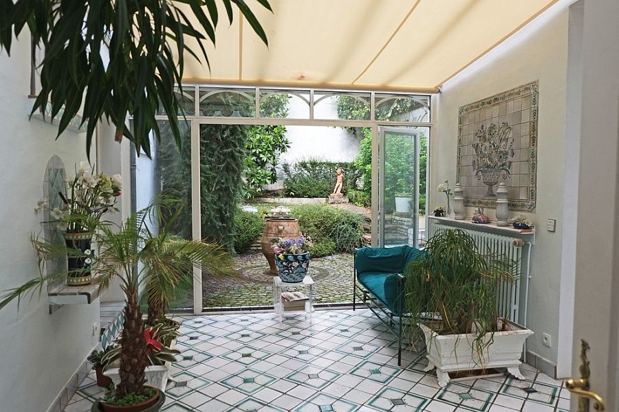 Small sunroom with Mediterranean flair and soothing ambiance