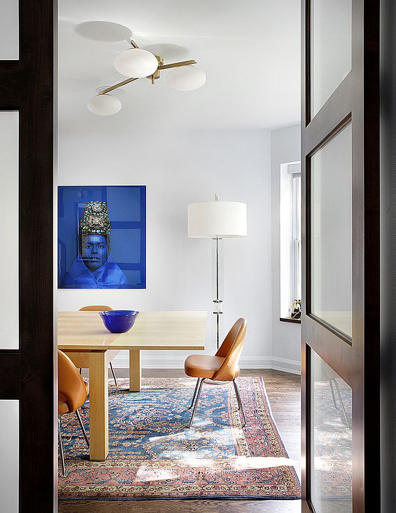 Spacing it just right in the dining room with rug [Design: Alan Design Studio]