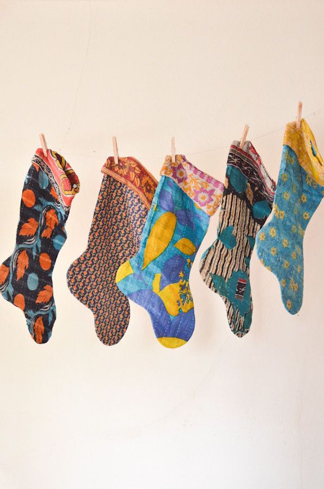 Stockings hung on a clothes line with clothing pins