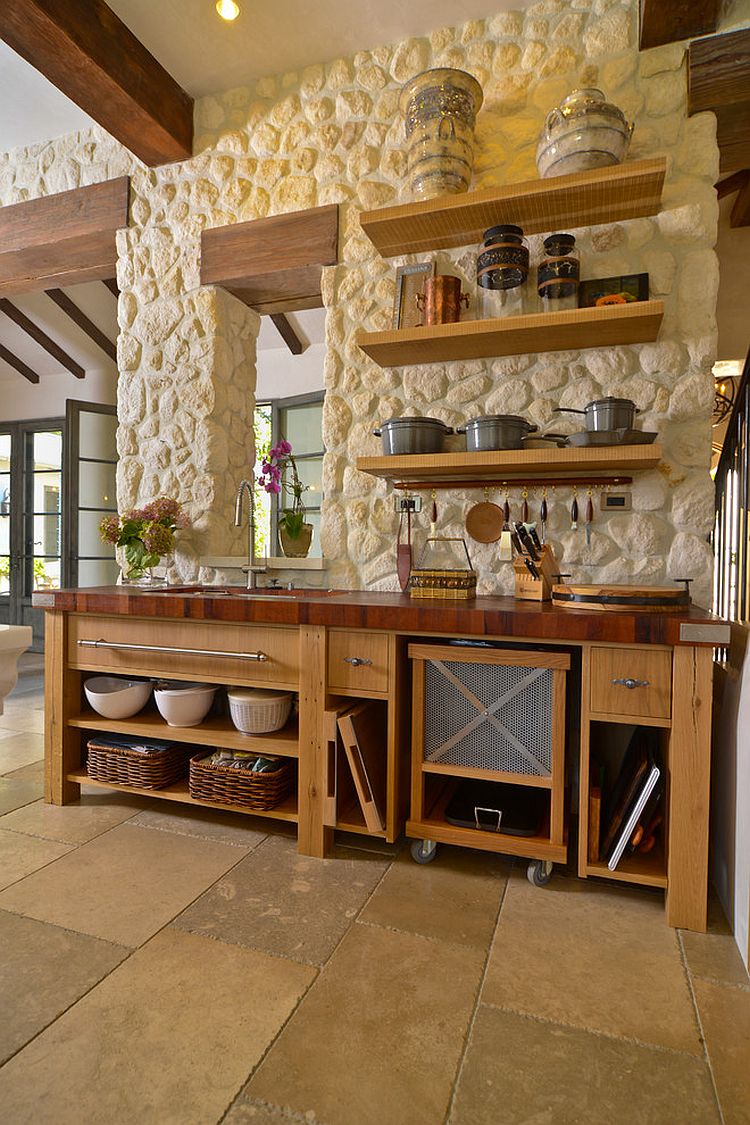 Stone and stucco house with a gorgeous Mediterranean kitchen that fits in with its overall ambiance [From: FGY Architects / Bernardo Grijalva Photography]