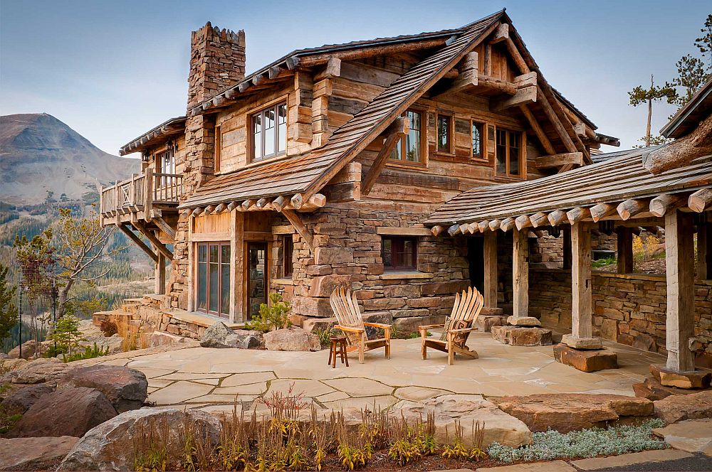 Stone walls and Rough-hewn timbers create one of a kind, rustic mountain home