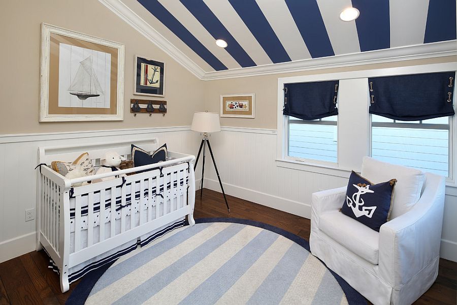 Stripes on the ceiling free up the walls in the nursery [Design: Robson Homes]