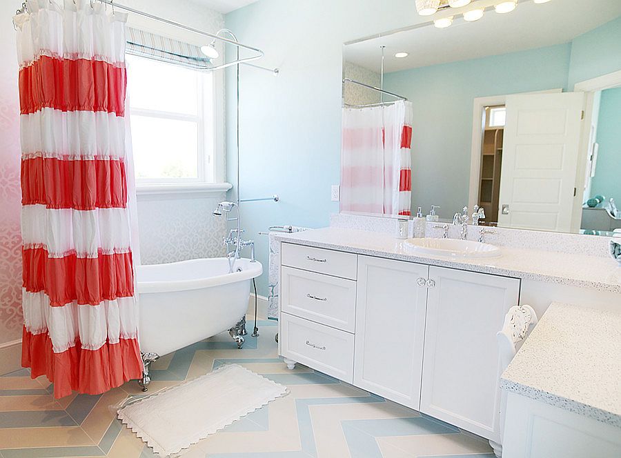 Stylish shabby chic bathroom in coral, blue and white