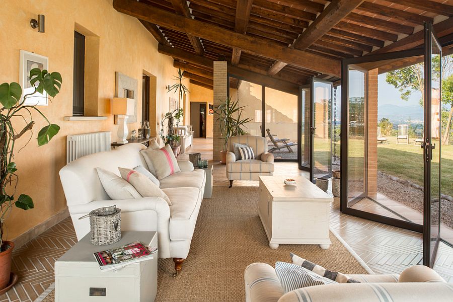 Textured walls are perfect for the Mediterranean sunroom [Design: Woide Angle Photography]