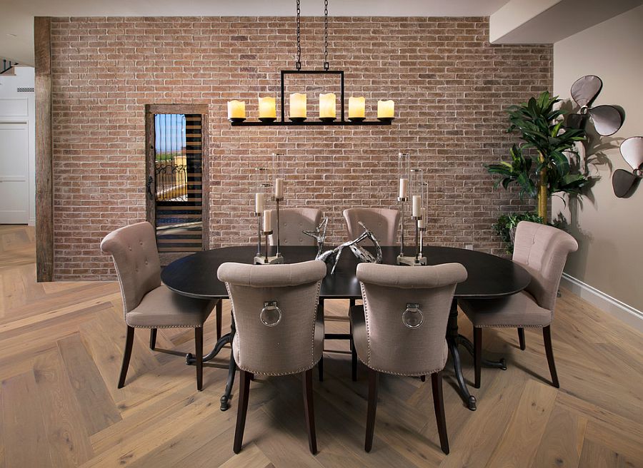 Transitional dining room with plush chairs in gray [Design: Luster Custom Homes & Remodeling]