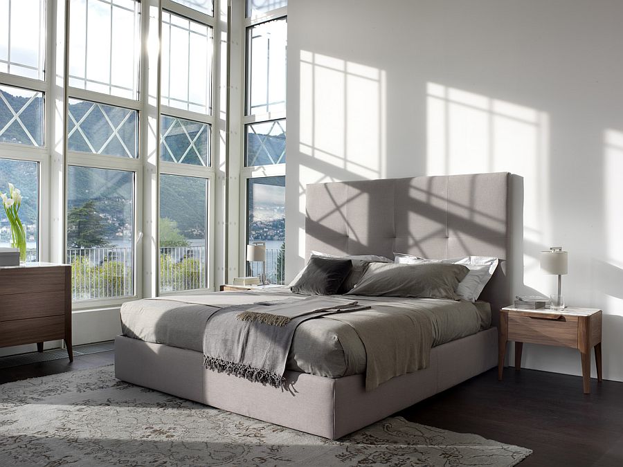 Upholstered headboard brings a touch of softness to the bedroom