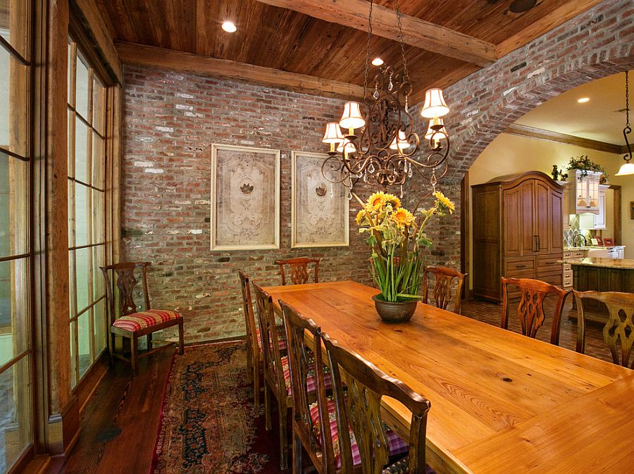 Vintage brick and lovely rug for the traditional dining room [Design: Terry M. Elston Builder]