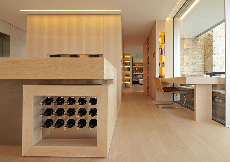 Wine storage built into the kitchen island elgantly