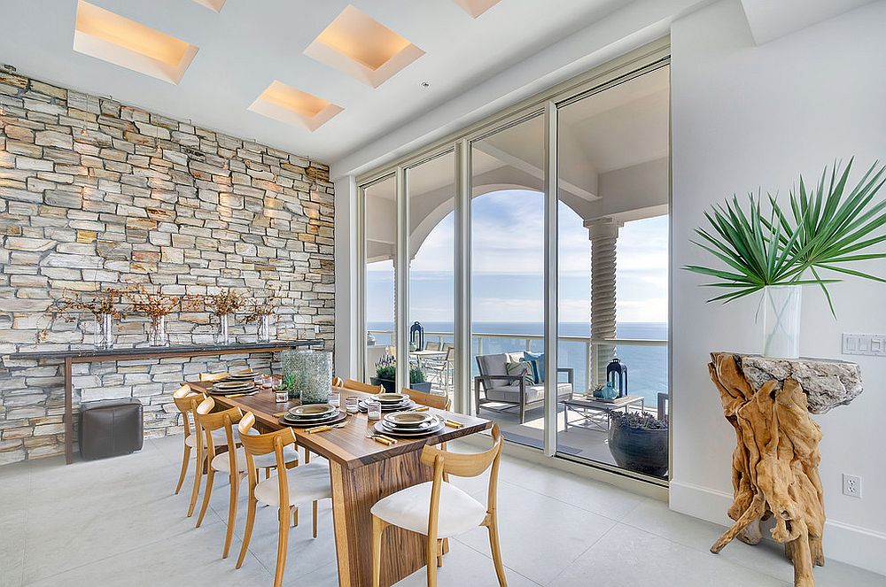 dining room with stone accents