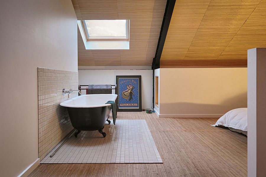 Bathtub in the corner of the upper level master bedroom