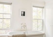 Bathtub-in-white-creates-a-relaxing-all-white-bathroom-217x155