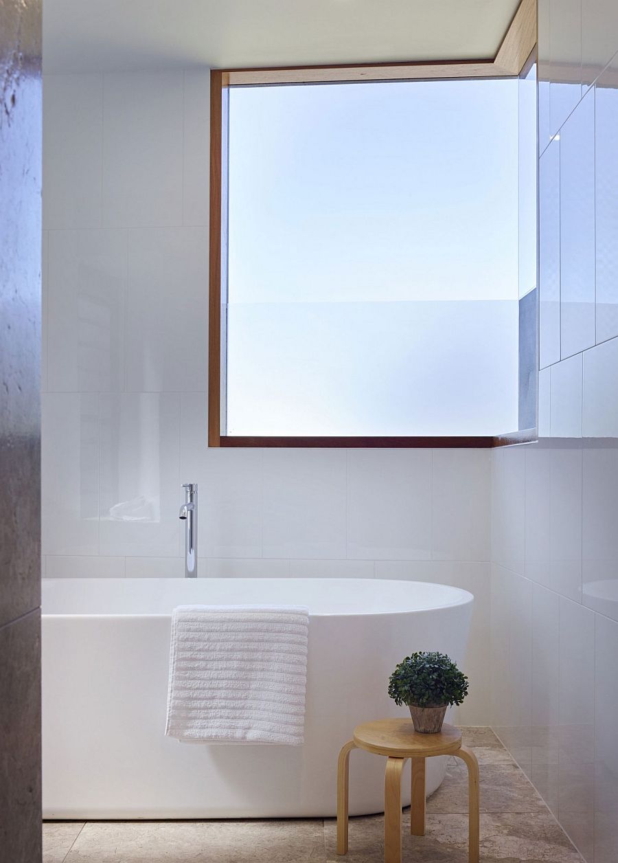 Beach style and contemporary elegance meet inside small bathroom