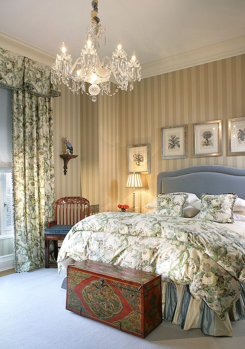 Bed skirt, antique chest and lighting usher in old world charm [Design: Treby Spanedda Interiors]