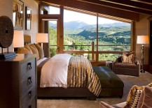 Bedroom-of-the-vacation-home-with-sloped-ceiling-and-unabated-mountain-views-217x155